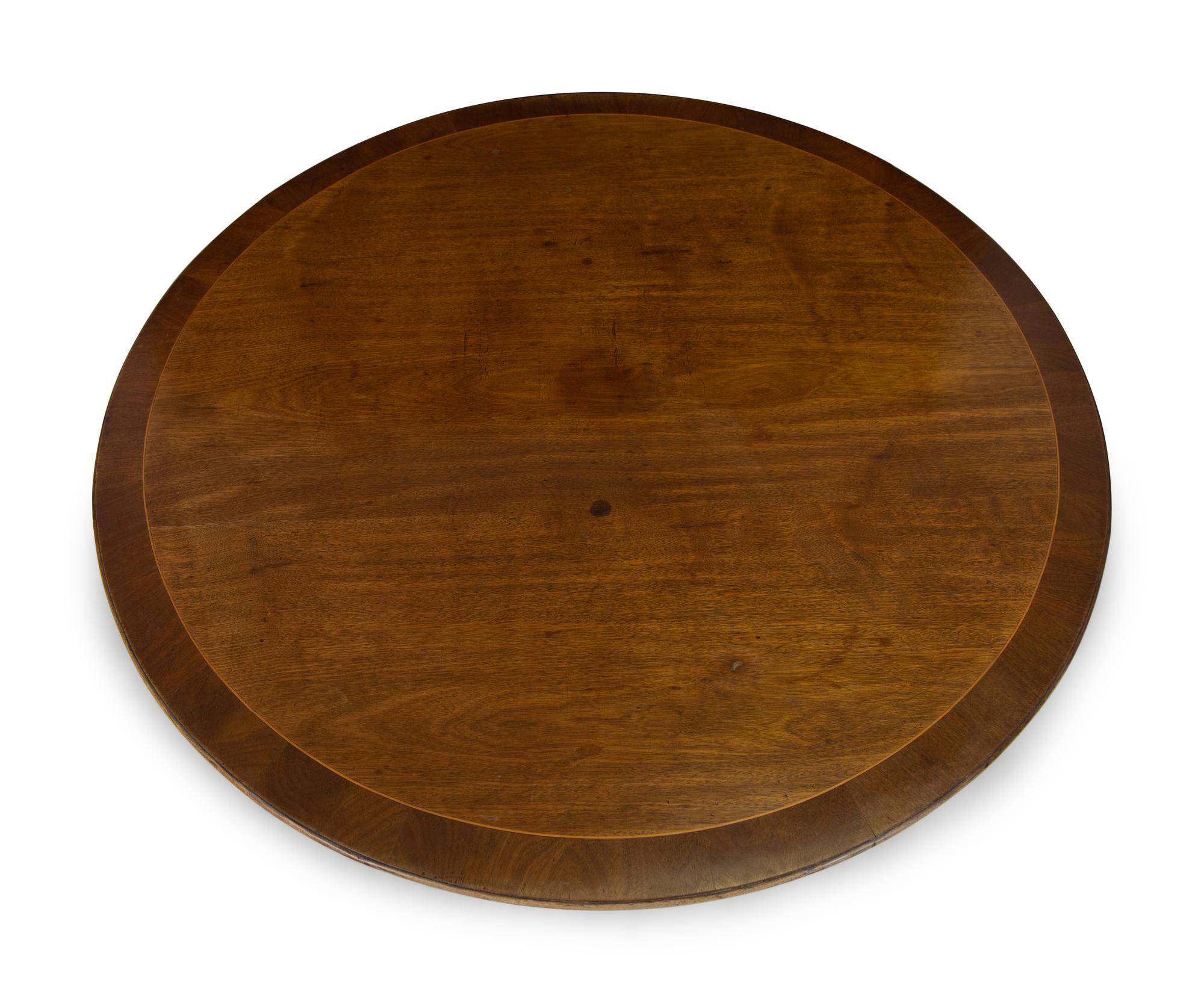 A Georgian Style Mahogany Tilt-Top Dining Table