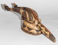 A Guro Polychromed Wood Mask. Height 26 inches.