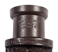 A Glazed Sewer Tile 'Liberty Head' Hanging Match Holder