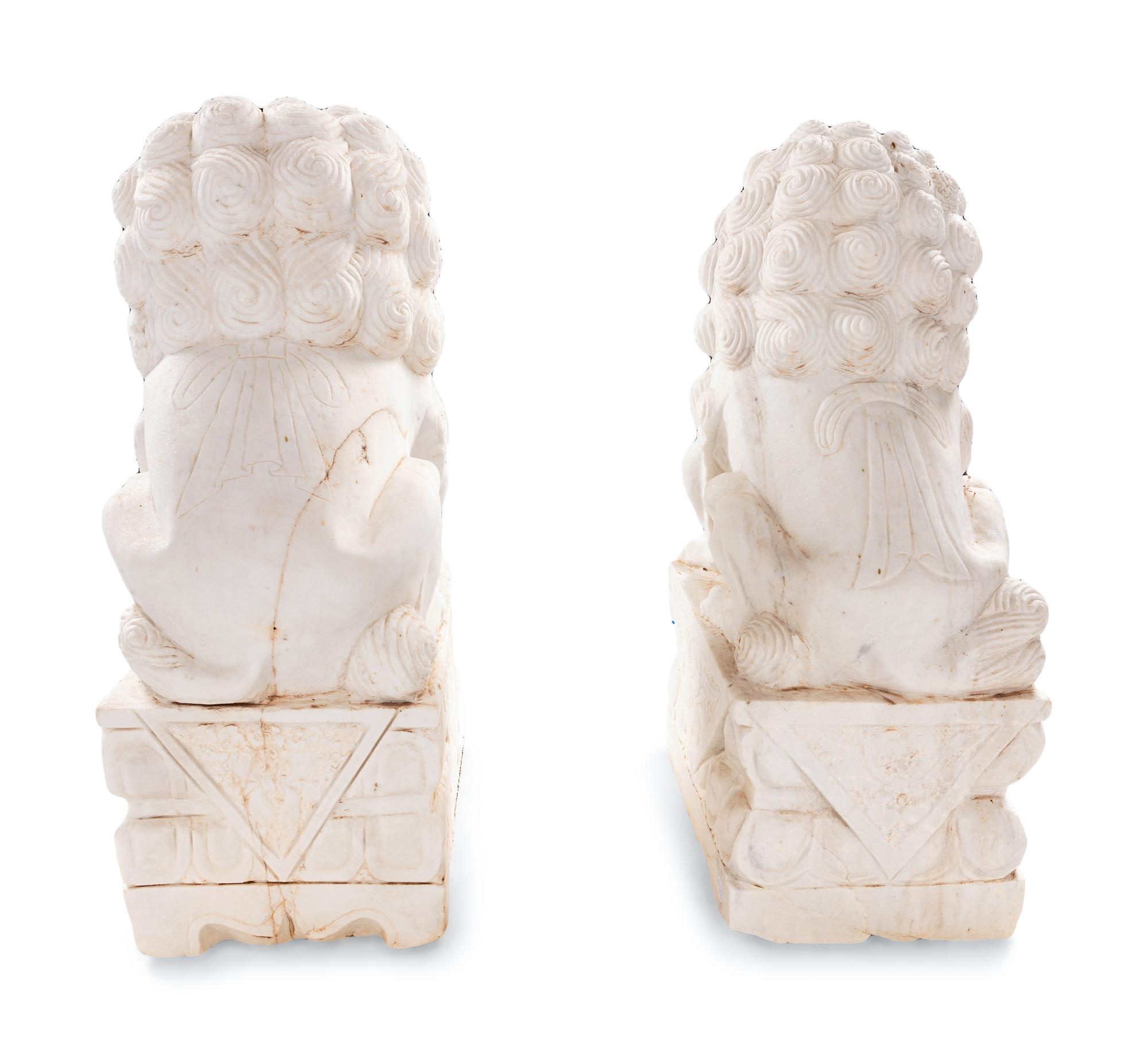 A Pair of Chinese Carved Marble Buddhistic Lions