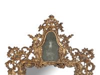 An Italian Silvered Wood and Etched Glass Mirror