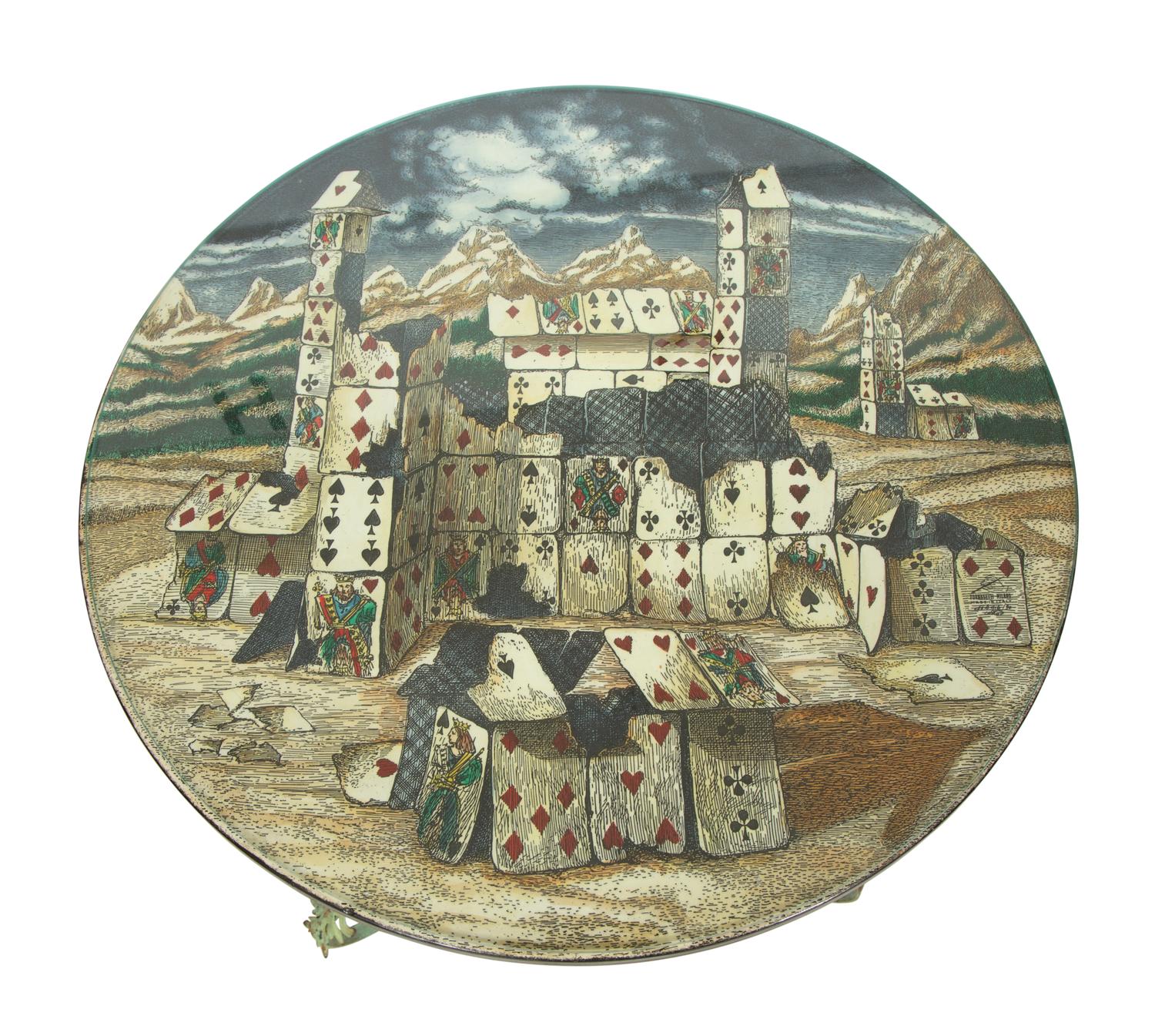 A Fornasetti Citta di Carte Table Top on Painted Wrought Iron Base