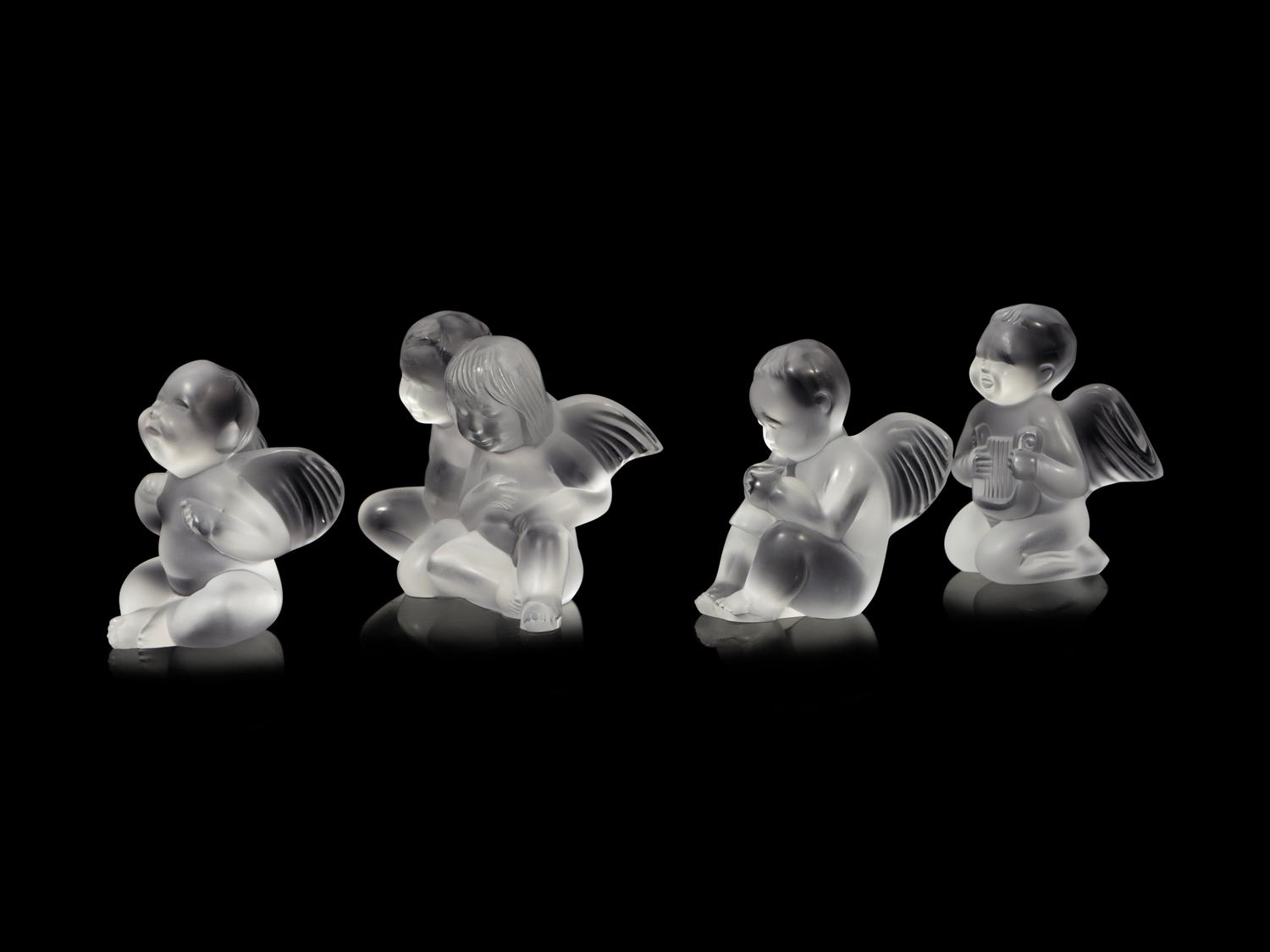 Four Lalique Cherub Figures