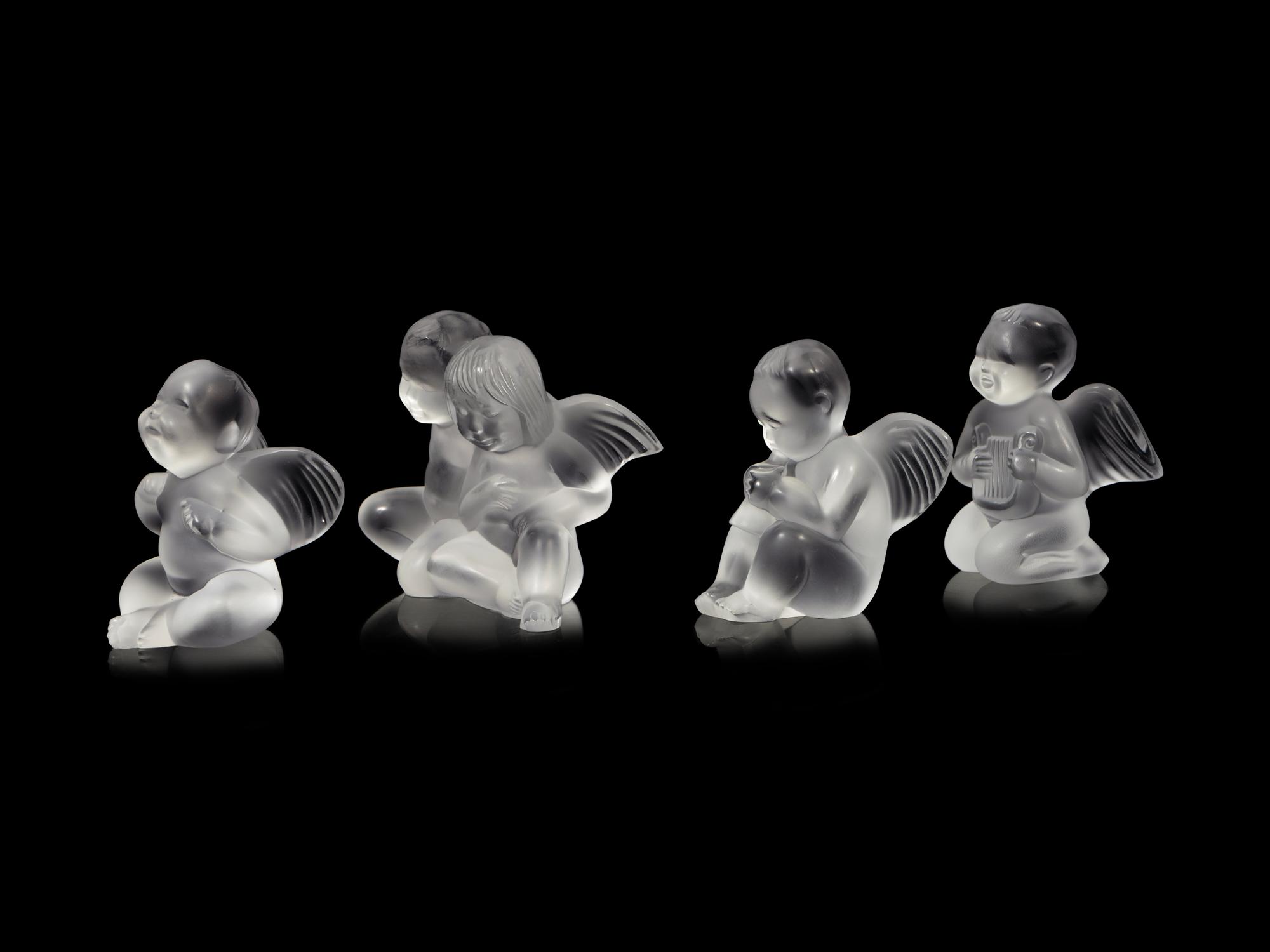 Four Lalique Cherub Figures