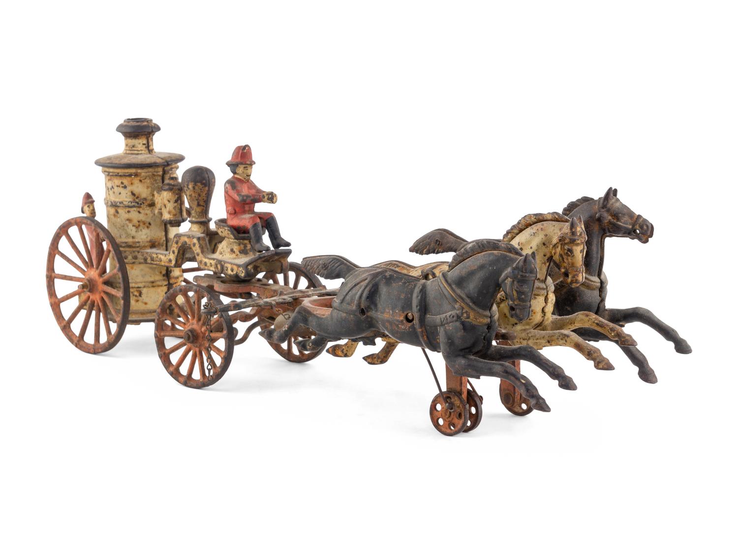 A Cast Iron Fire Engine Three-Horse Train and a Horse Pull Toy