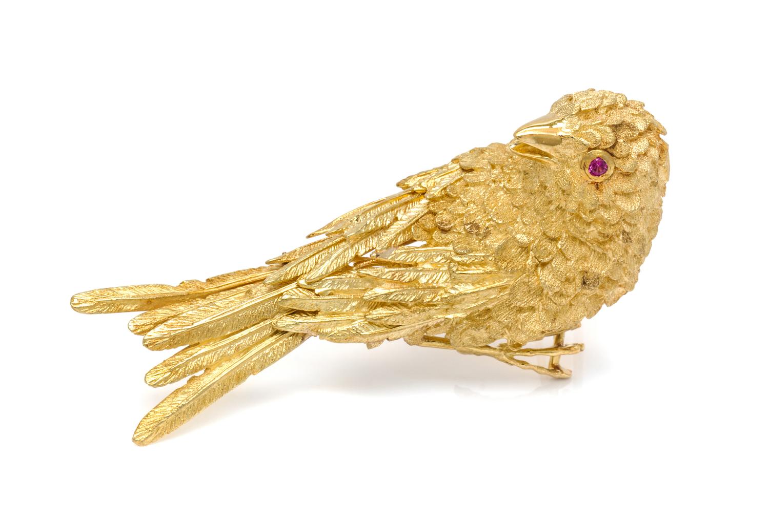 An 18 Karat Yellow Gold and Ruby Bird Brooch, 26.00 dwts.