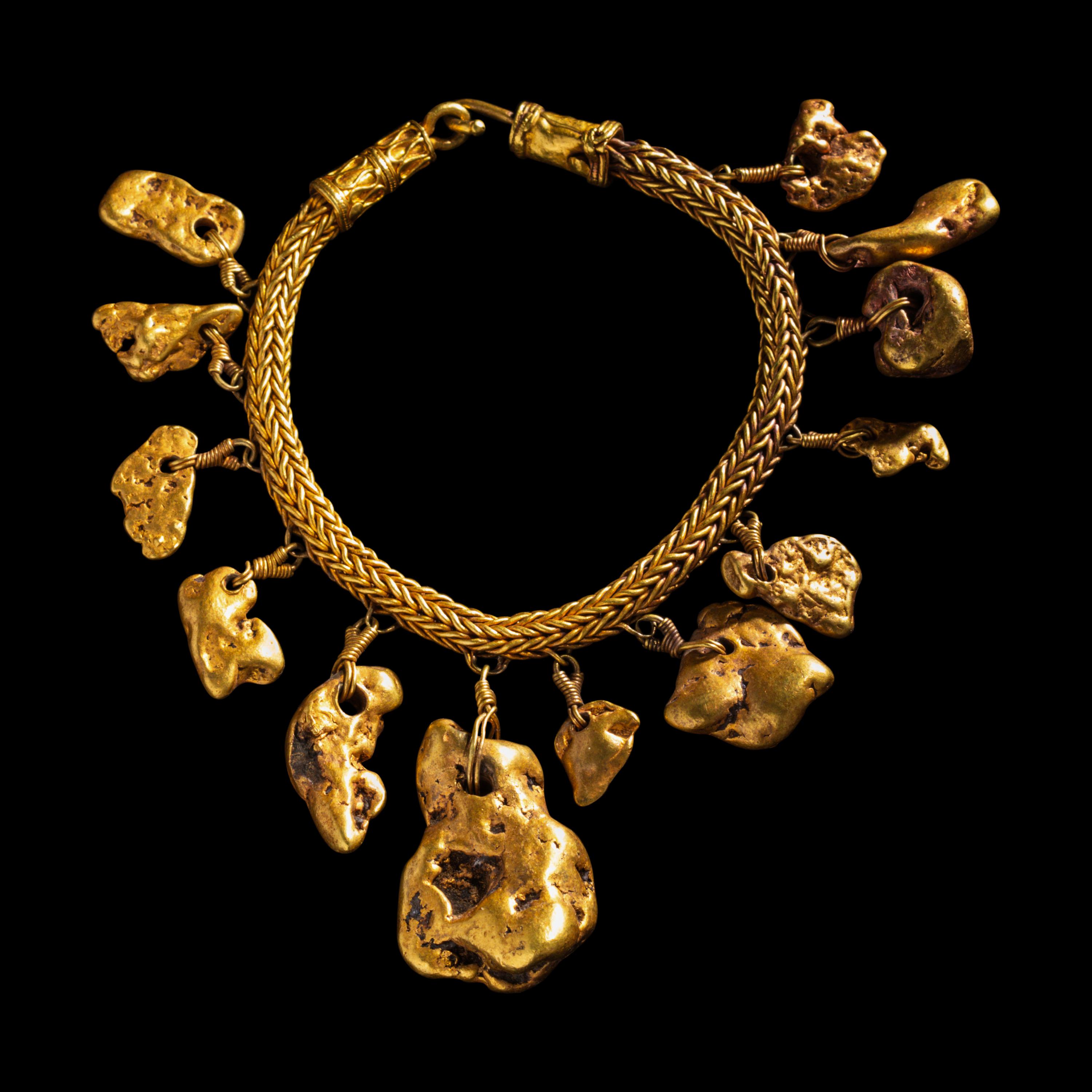 A Greek Gold Bracelet with Nugget Pendants