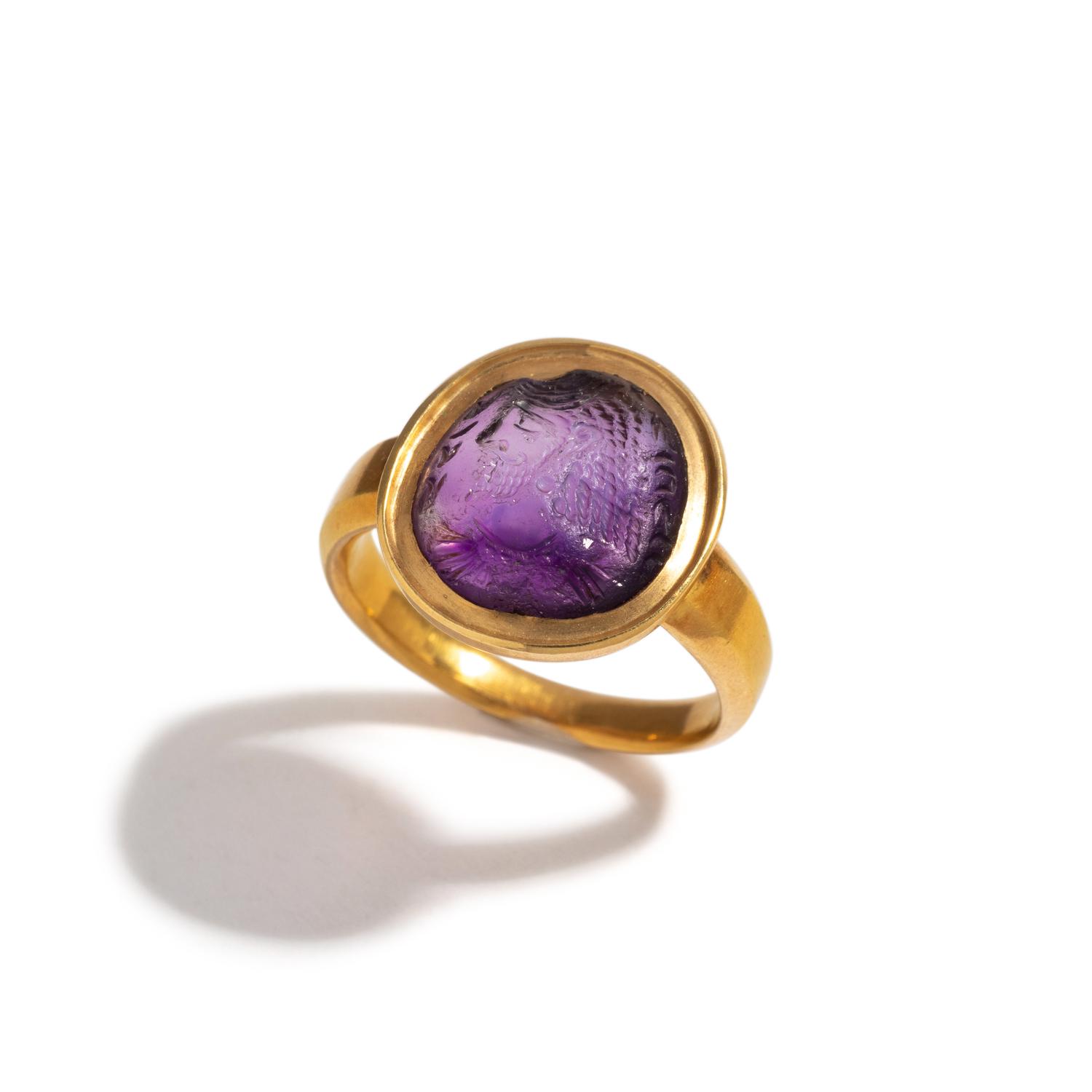 A Sasanian Amethyst Ring Stone with a Royal Portrait and Pahlavi Inscription — Set in a gold ring