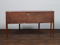 A Federal Figured Mahogany Serpentine Sideboard