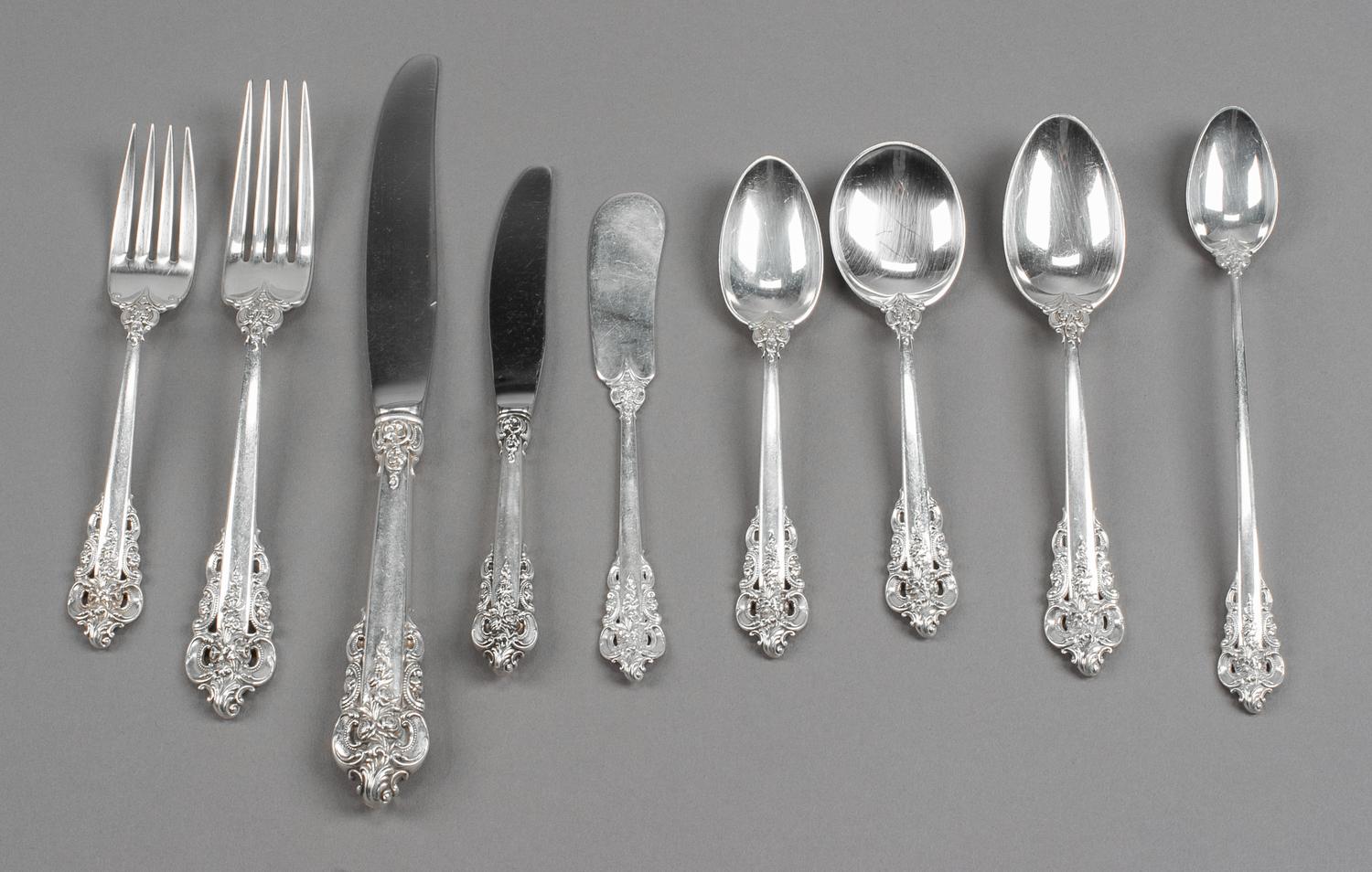 An American Silver Flatware Service, Wallace Silversmiths, Wallingford, CT, Grand Baroque pattern, comprising: 8 dinner knives 12 desse