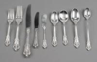 An American Silver Flatware Service, Wallace Silversmiths, Wallingford, CT, Grand Baroque pattern, comprising: 8 dinner knives 12 desse