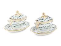 A Pair of English Porcelain Covered Sauce Tureens with Attached Underplates