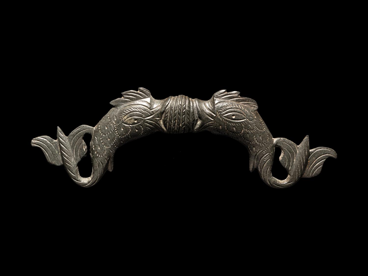 A Roman Bronze Double-Dolphin Handle
