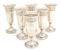 A Group of Six American Weighted Silver Footed Glasses, M. Fred Hirsch, Jersey City, NJ, having flared rim with chased band of floral s
