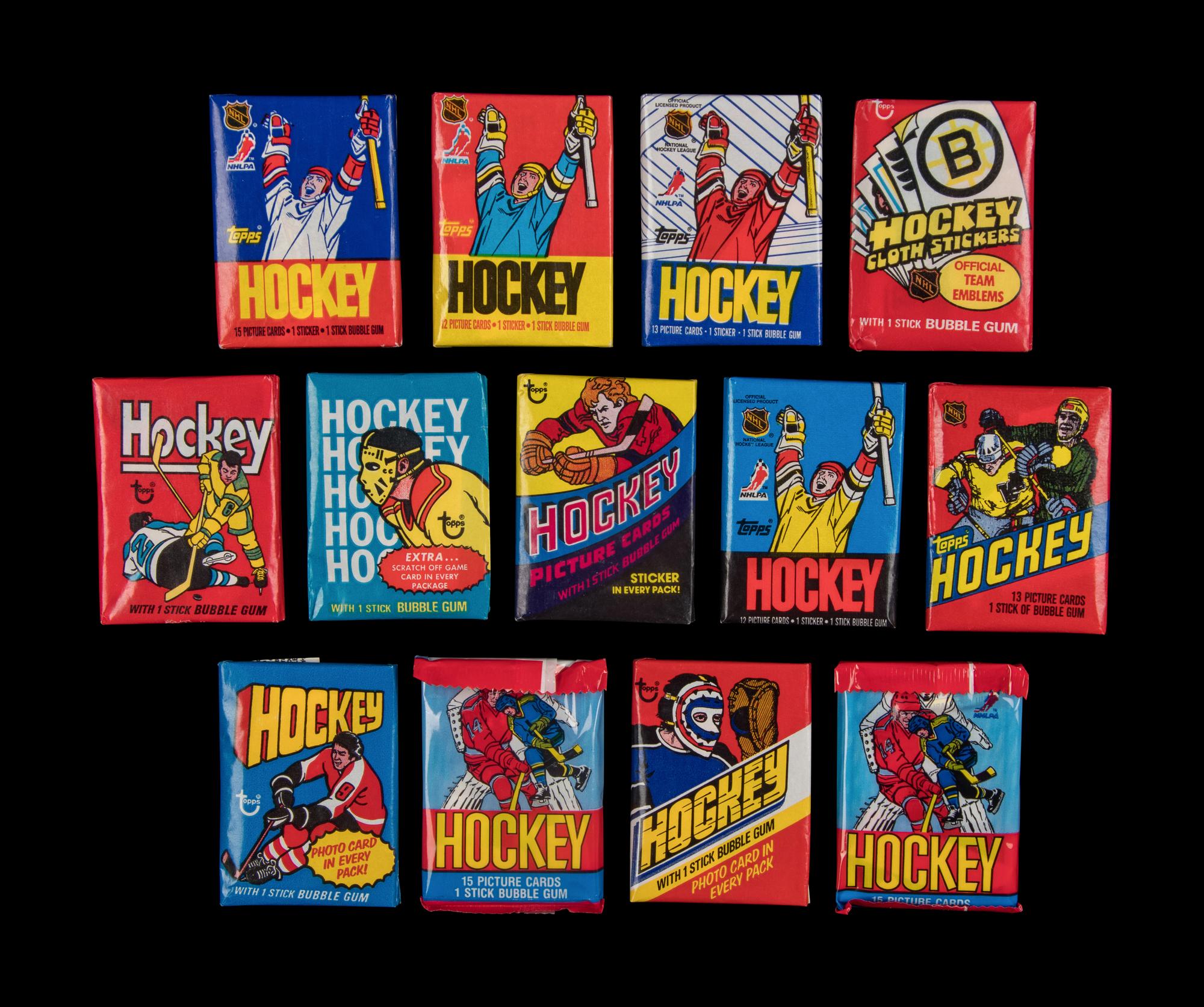 A Collection of 1974-90 Topps Hockey Sealed Wax Packs