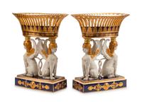 A Pair of Sevres Style Porcelain Figural Corbeilles