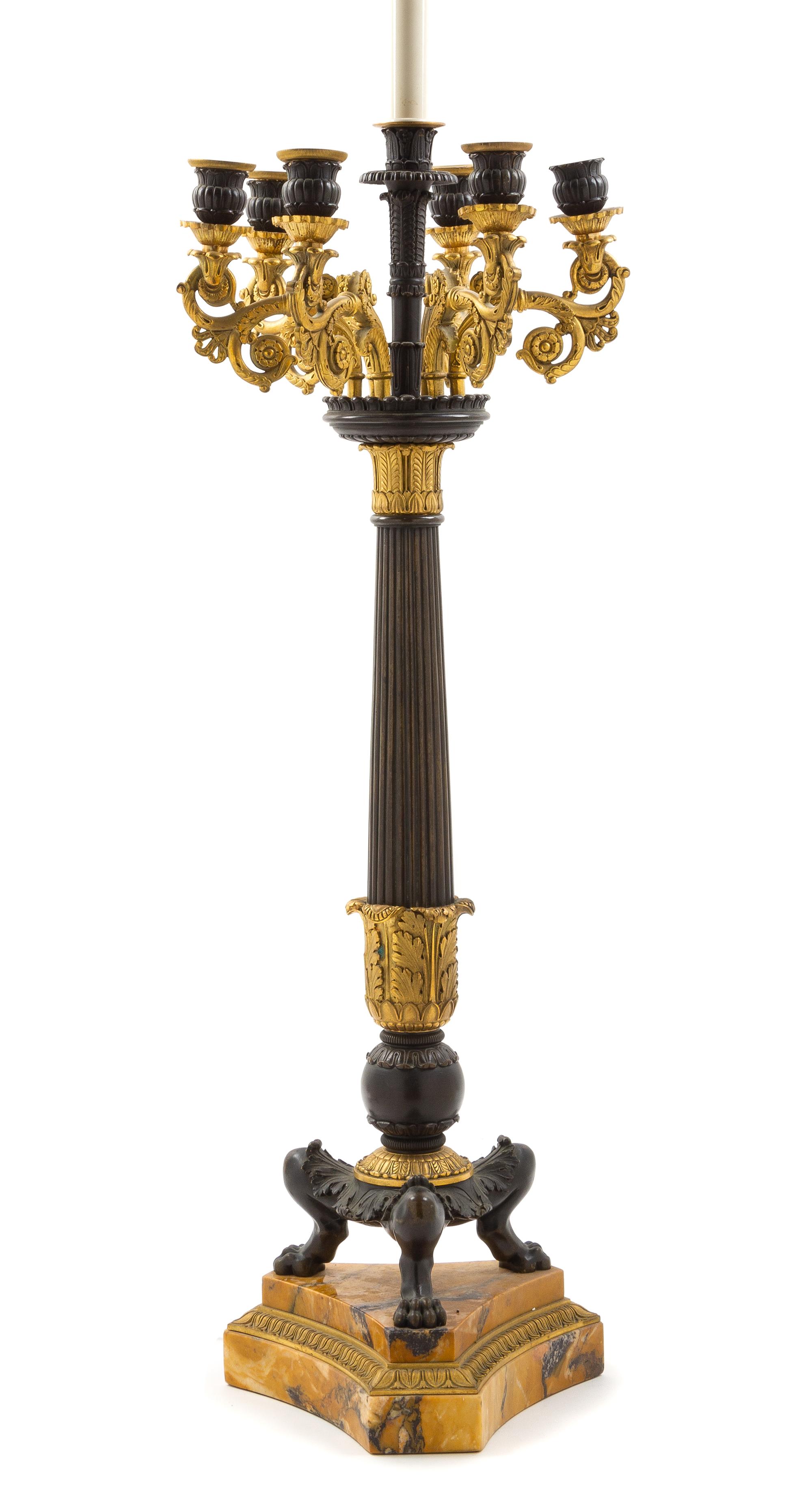 A Gilt and Patinated Bronze Six-Light Candelabrum Mounted as a Lamp Height overall 40 inches. — 20TH CENTURY