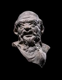 A Hellenistic Terracotta Head of a Satyr
