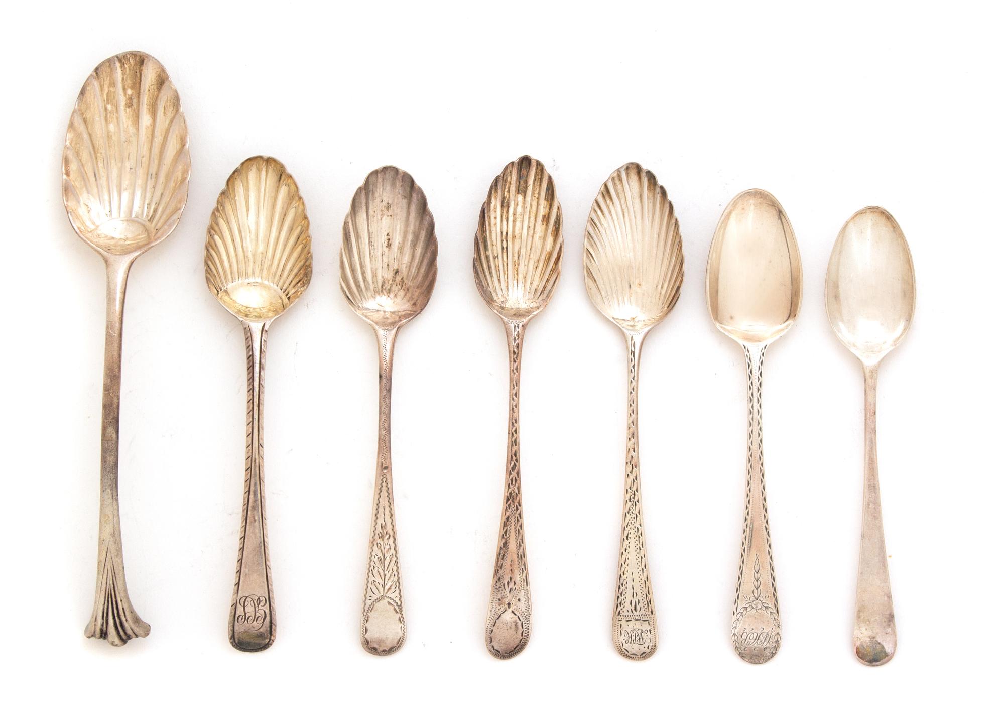 A Collection of Fifty English Silver Shell Spoons, Various Makers and Dates,