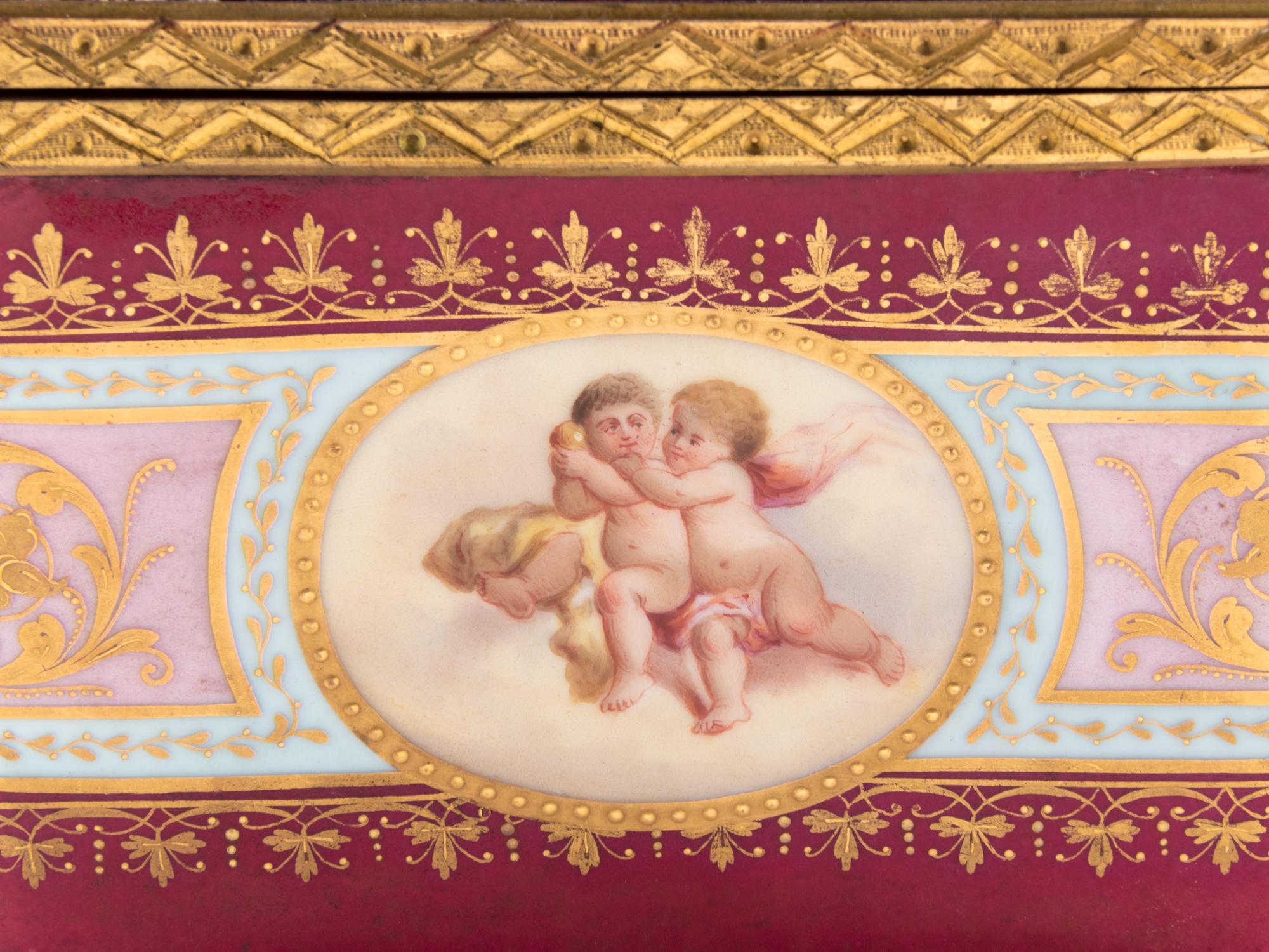 A Vienna Gilt Metal Mounted, Painted and Parcel Gilt Porcelain Table Casket