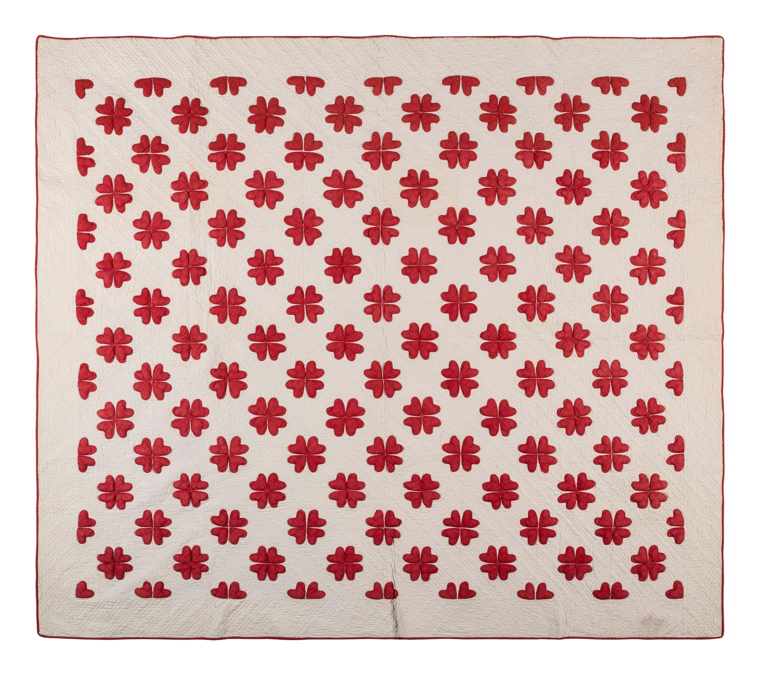 A Trapunto 'Heart' Pattern Cotton Quilt