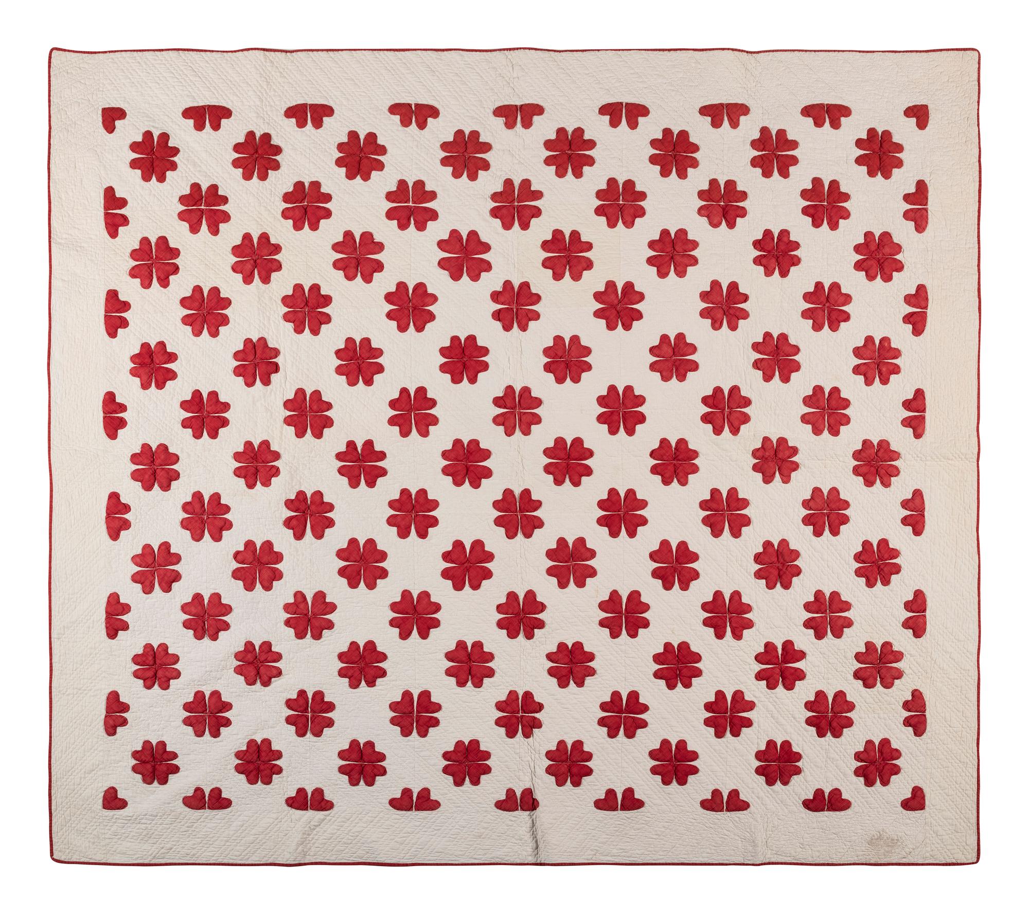 A Trapunto 'Heart' Pattern Cotton Quilt