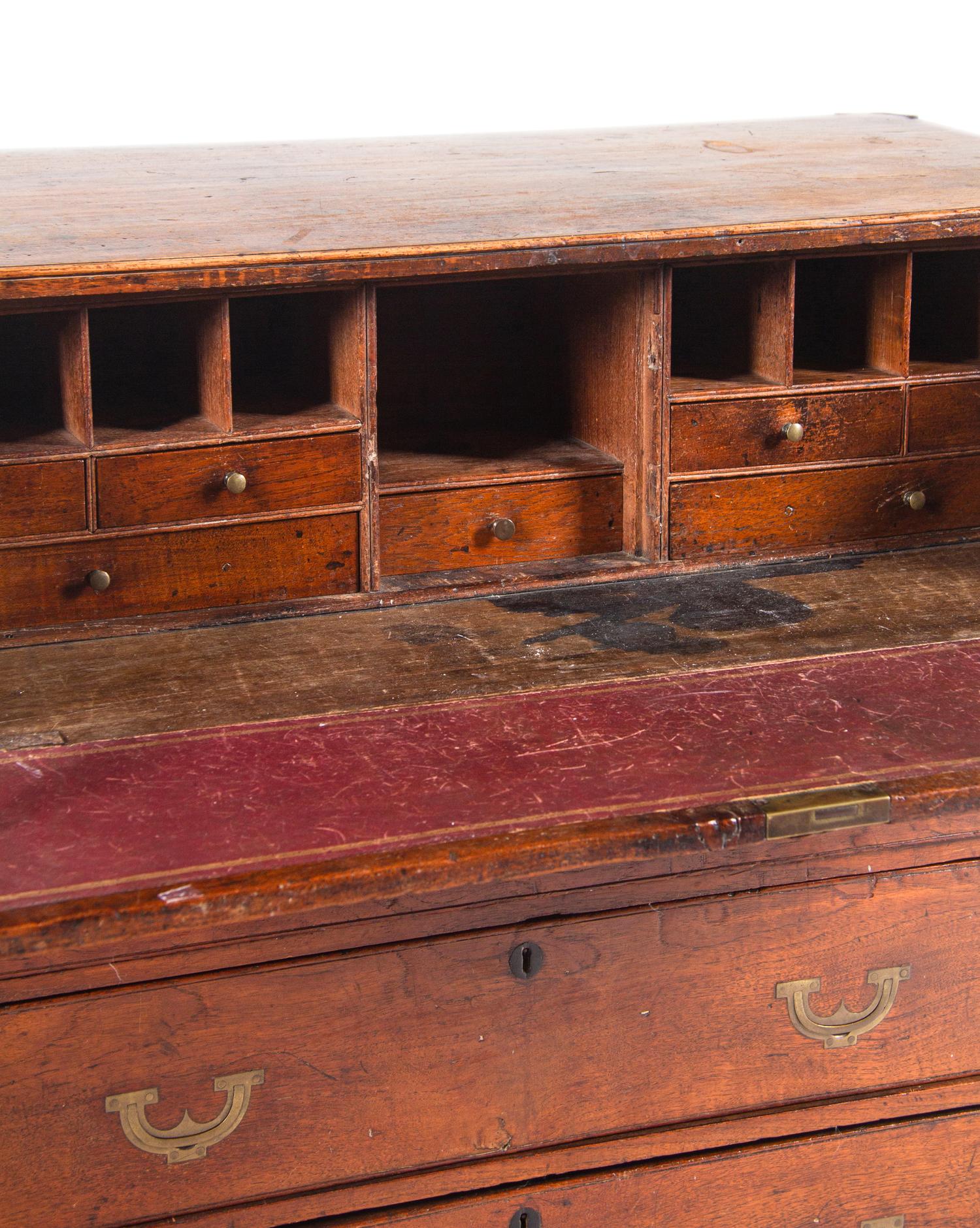 An English Brass Mounted Elm Campaign Desk