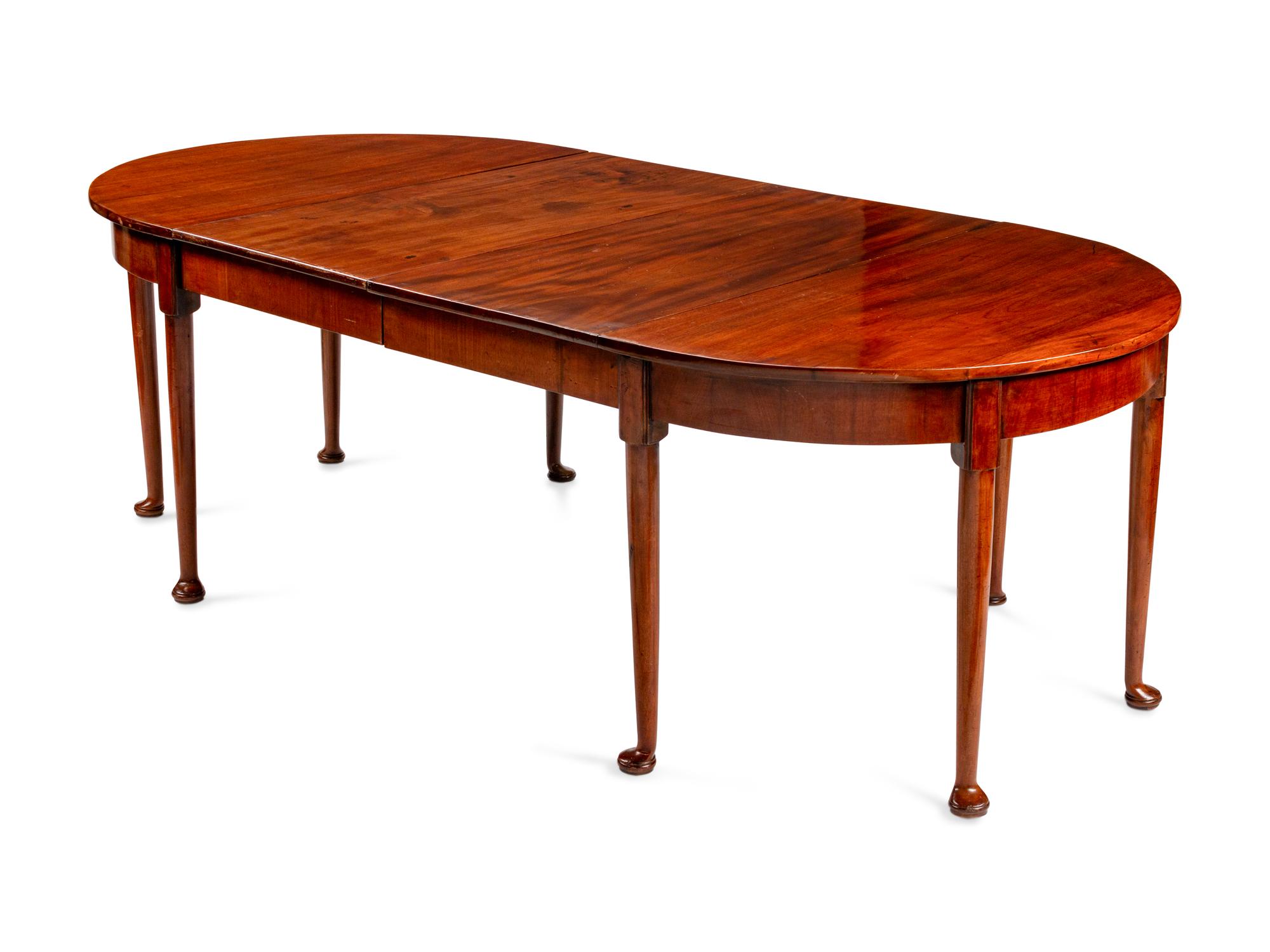 A Queen Anne Style Mahogany Oval Dining Table