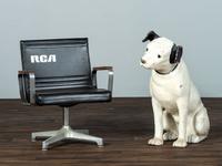 A Large RCA Papier Mache 'Nipper' Store Display Figure and RCA Armchair