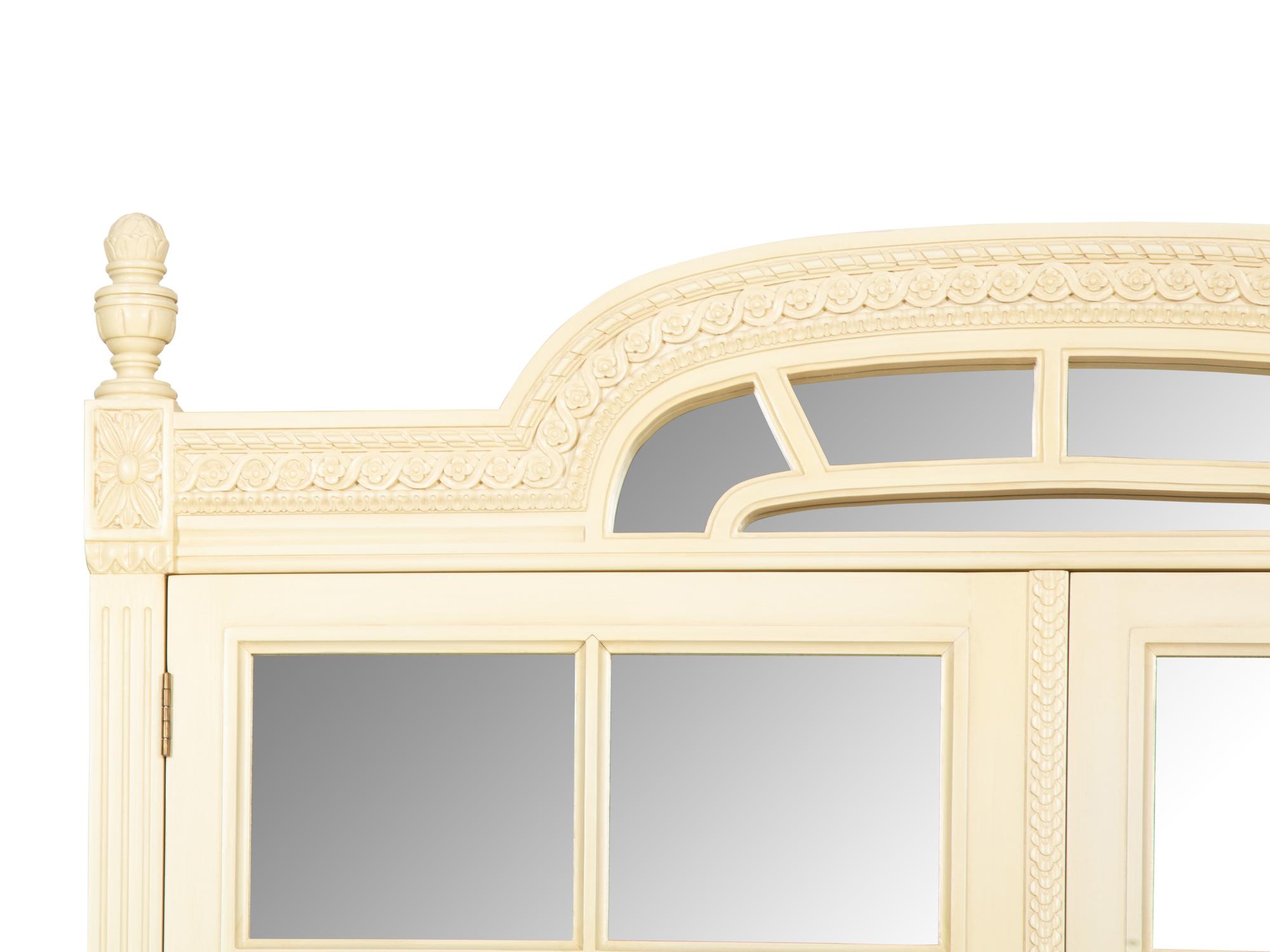 A Louis XVI Style White Painted Four-Door Armoire by Julia Gray, New York