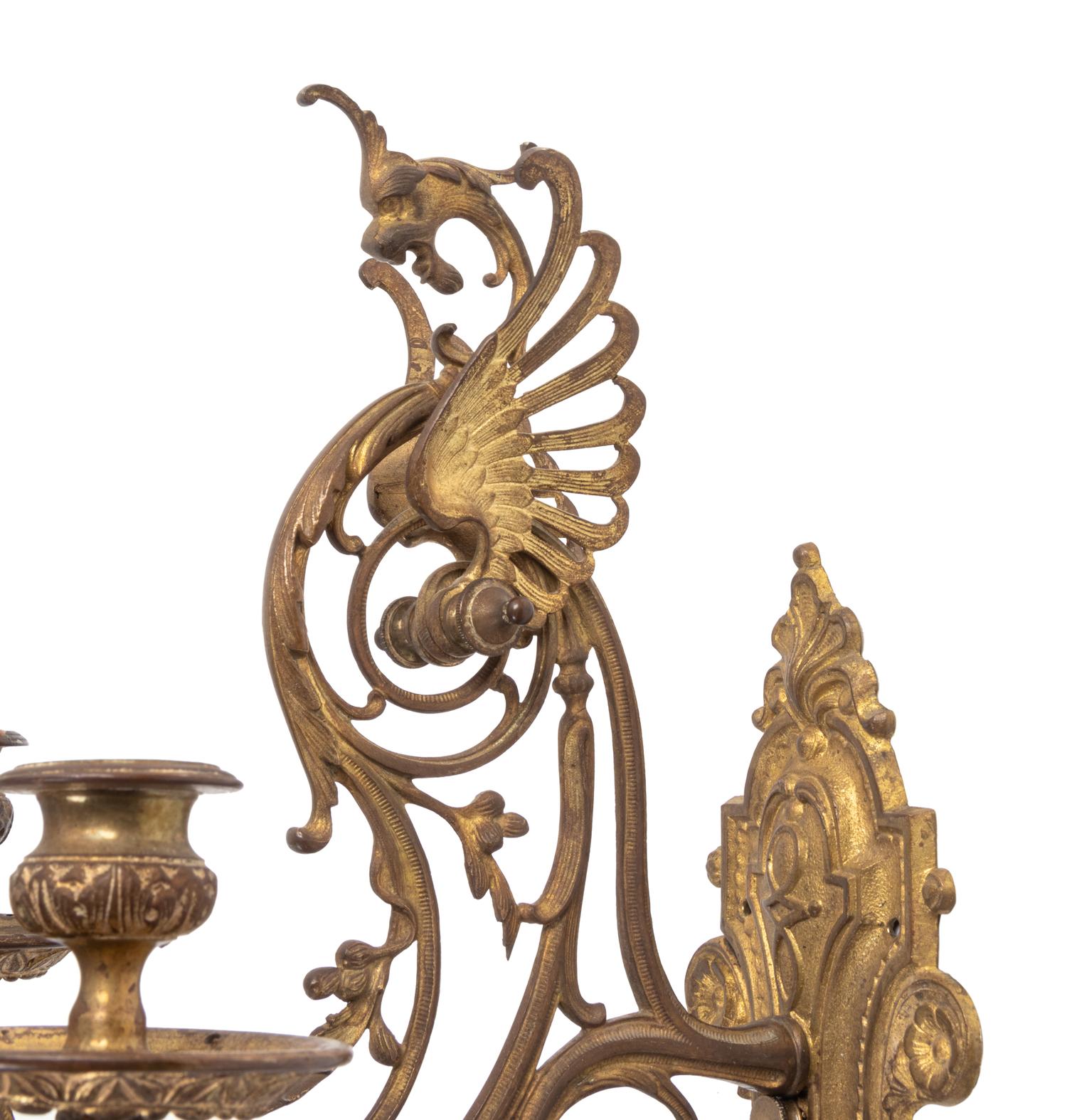 A Pair of Neoclassical Gilt Bronze Three-Light Sconces