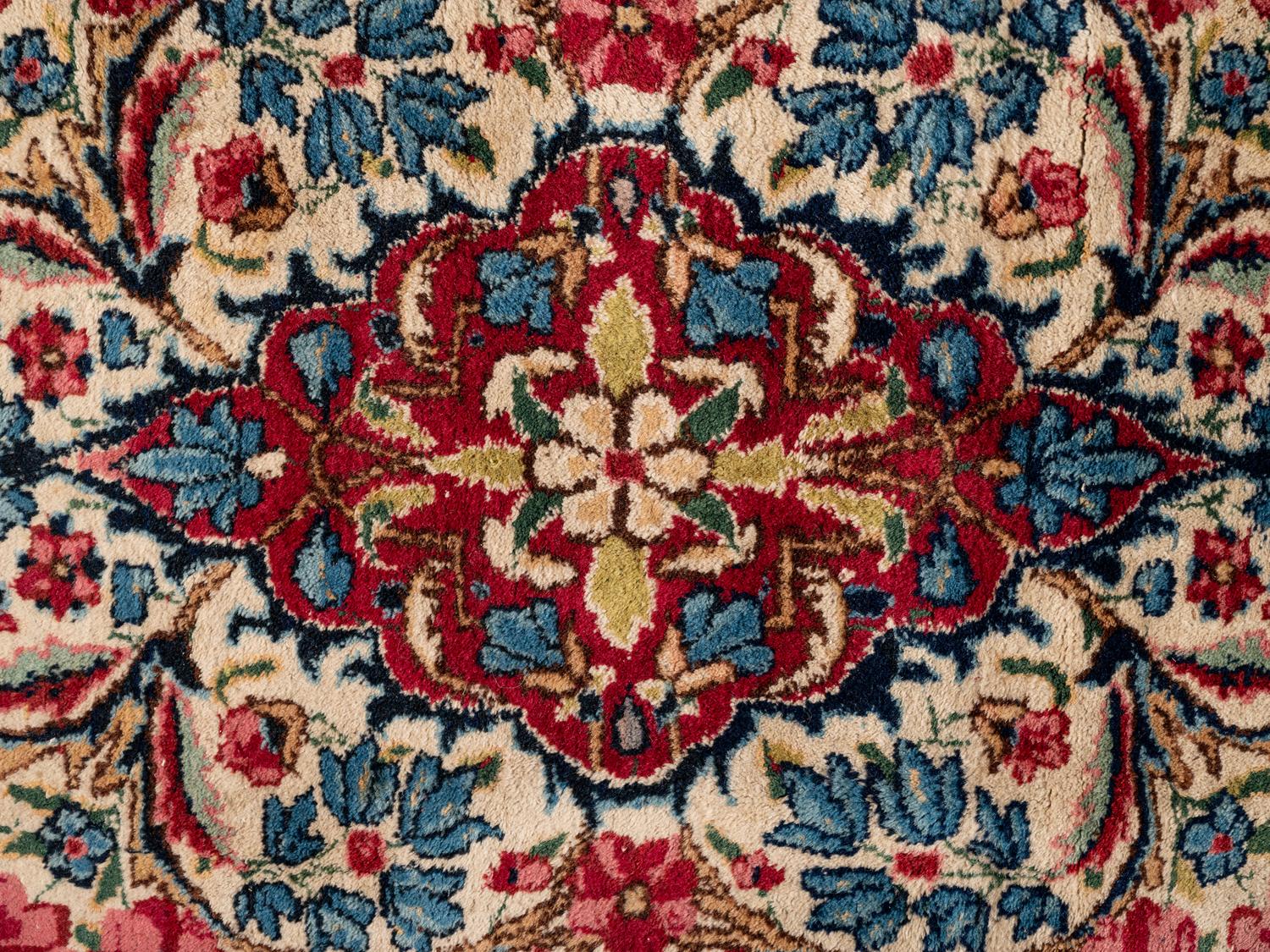A Kirman Wool Rug