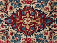 A Kirman Wool Rug