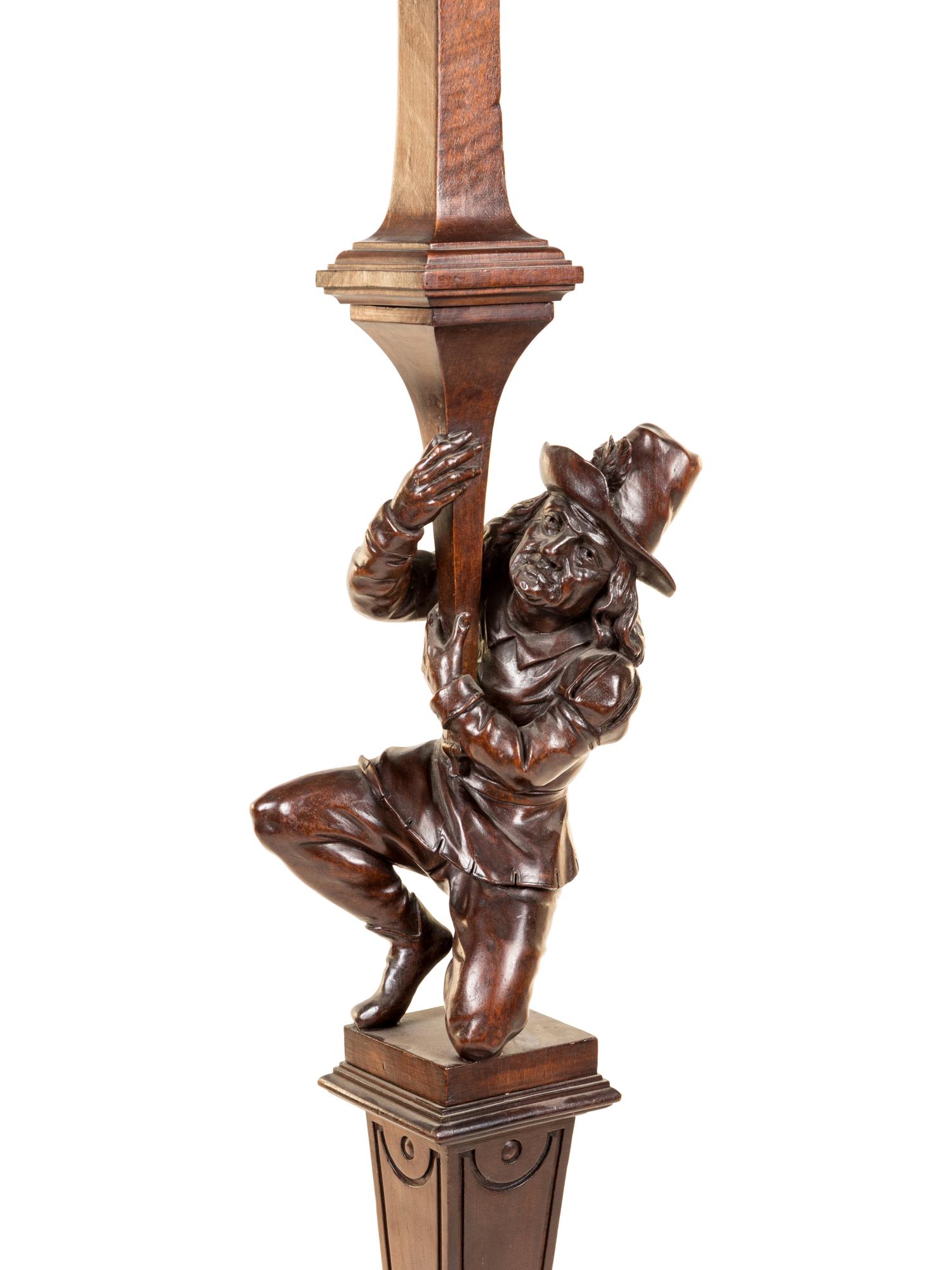A Black Forest Carved Pricket