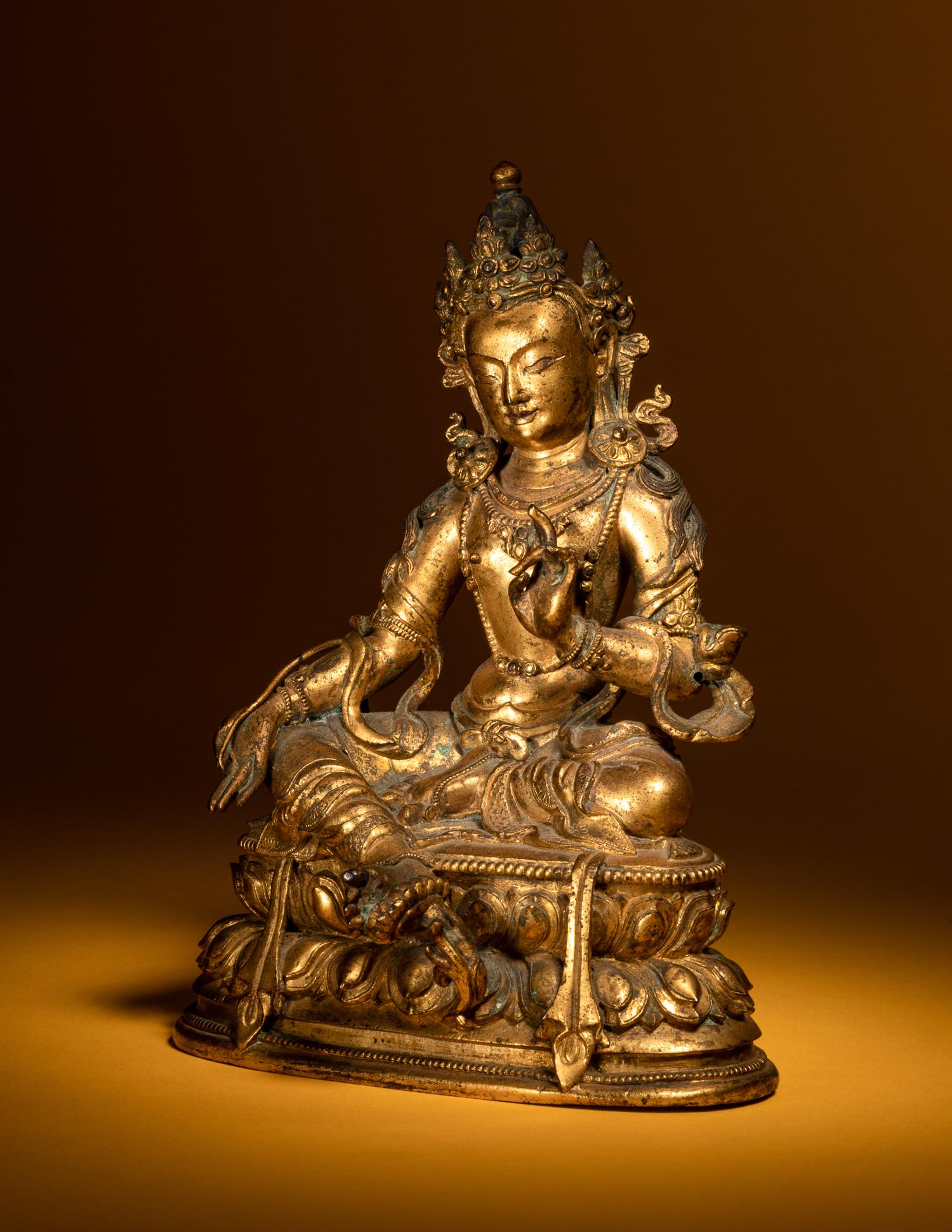A Sino-Tibetan Gilt Bronze Figure of Seated Tara