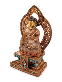 A Tibetan Style Rock Crystal, Gilt Metal Filigree, Turquoise and Carnelian Deity