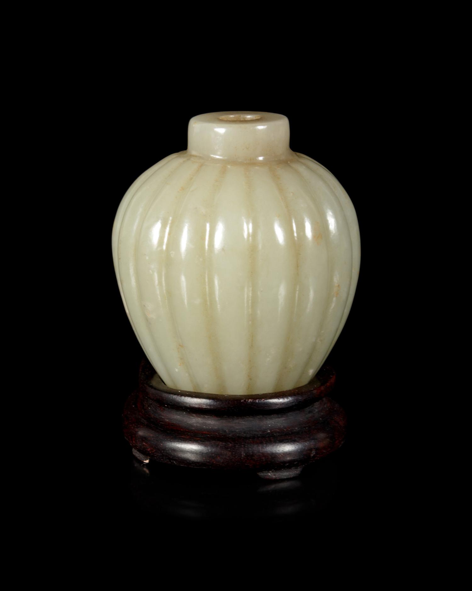 A Chinese Celadon Jade Snuff Bottle