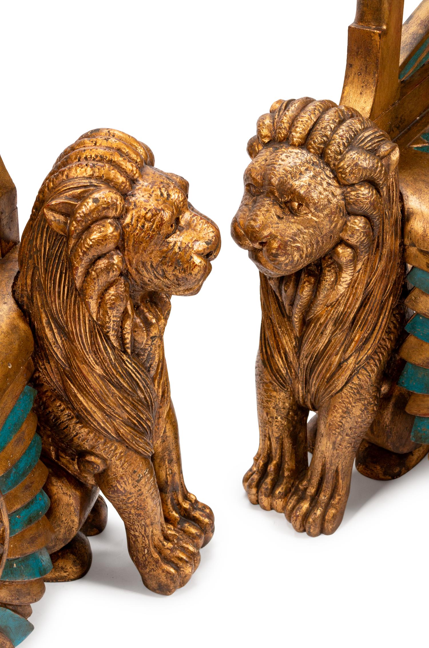 A Pair of Egyptian Revival Style Parcel-Gilt and Polychromed Throne Chairs