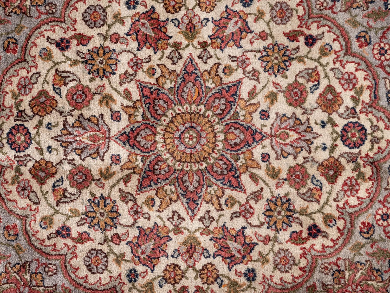 A Tabriz Wool Rug