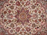 A Tabriz Wool Rug