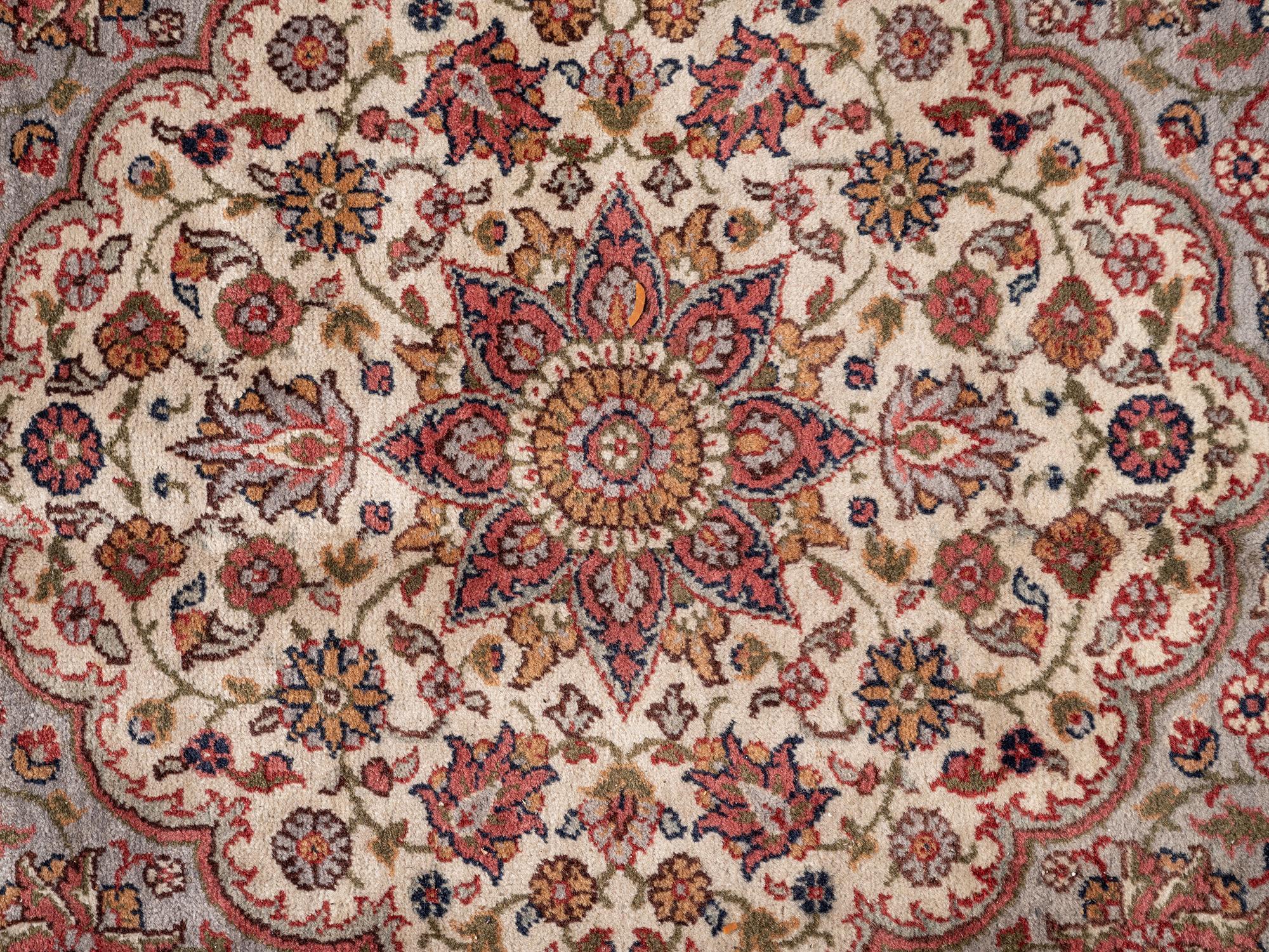 A Tabriz Wool Rug