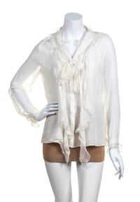 An Oscar de la Renta Cream Silk Blouse,