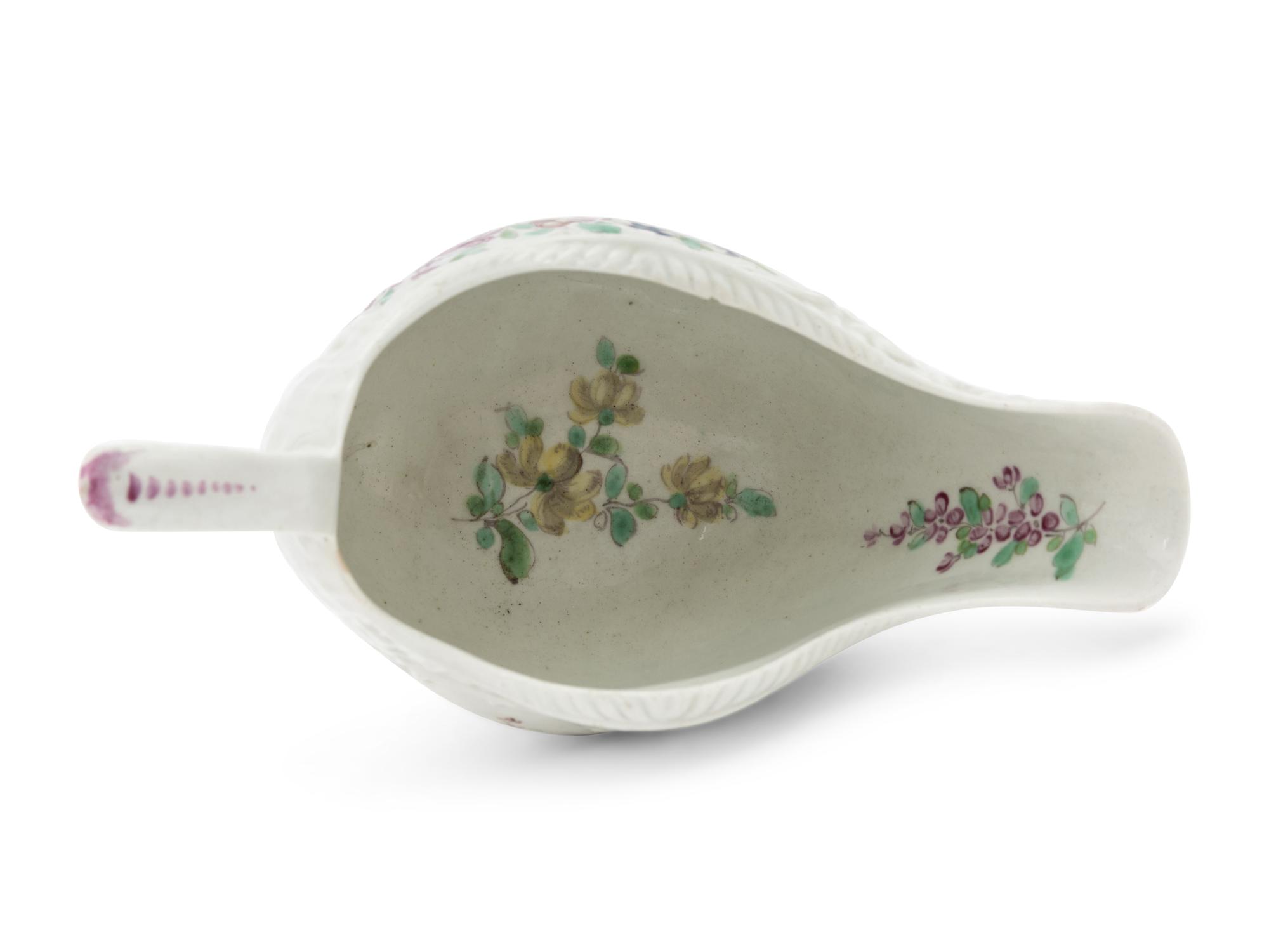 A Pair of Liverpool Porcelain Sauceboats