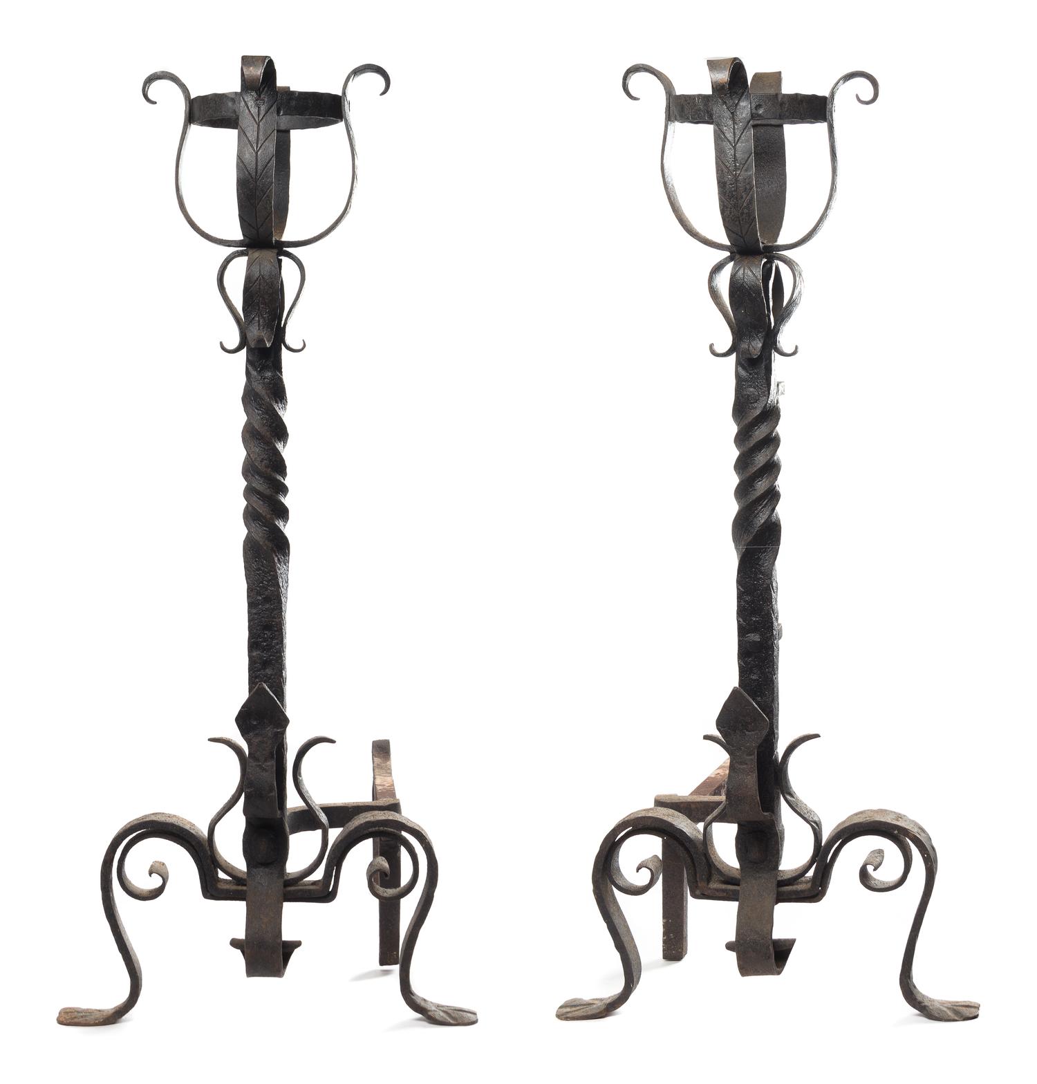 A Pair of Large Wrought Iron Andirons Height 39 inches.