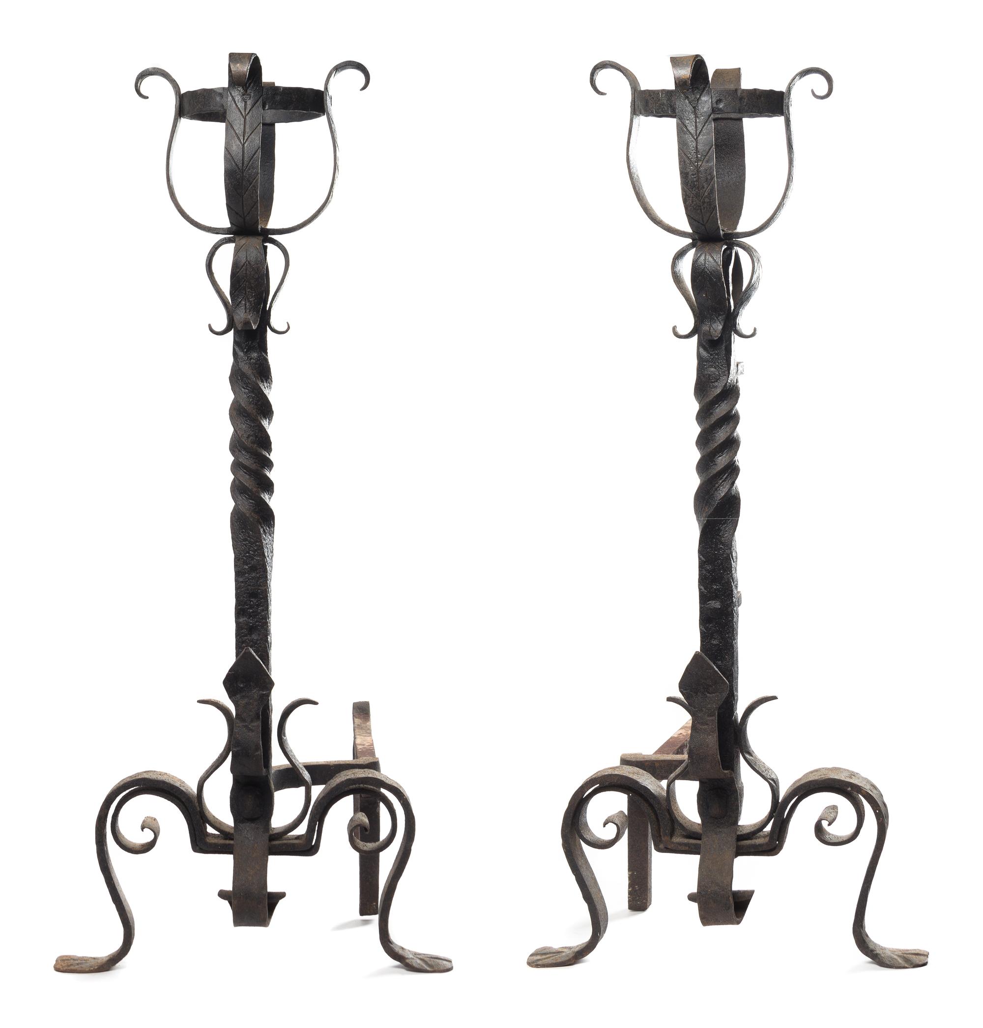 A Pair of Large Wrought Iron Andirons Height 39 inches.