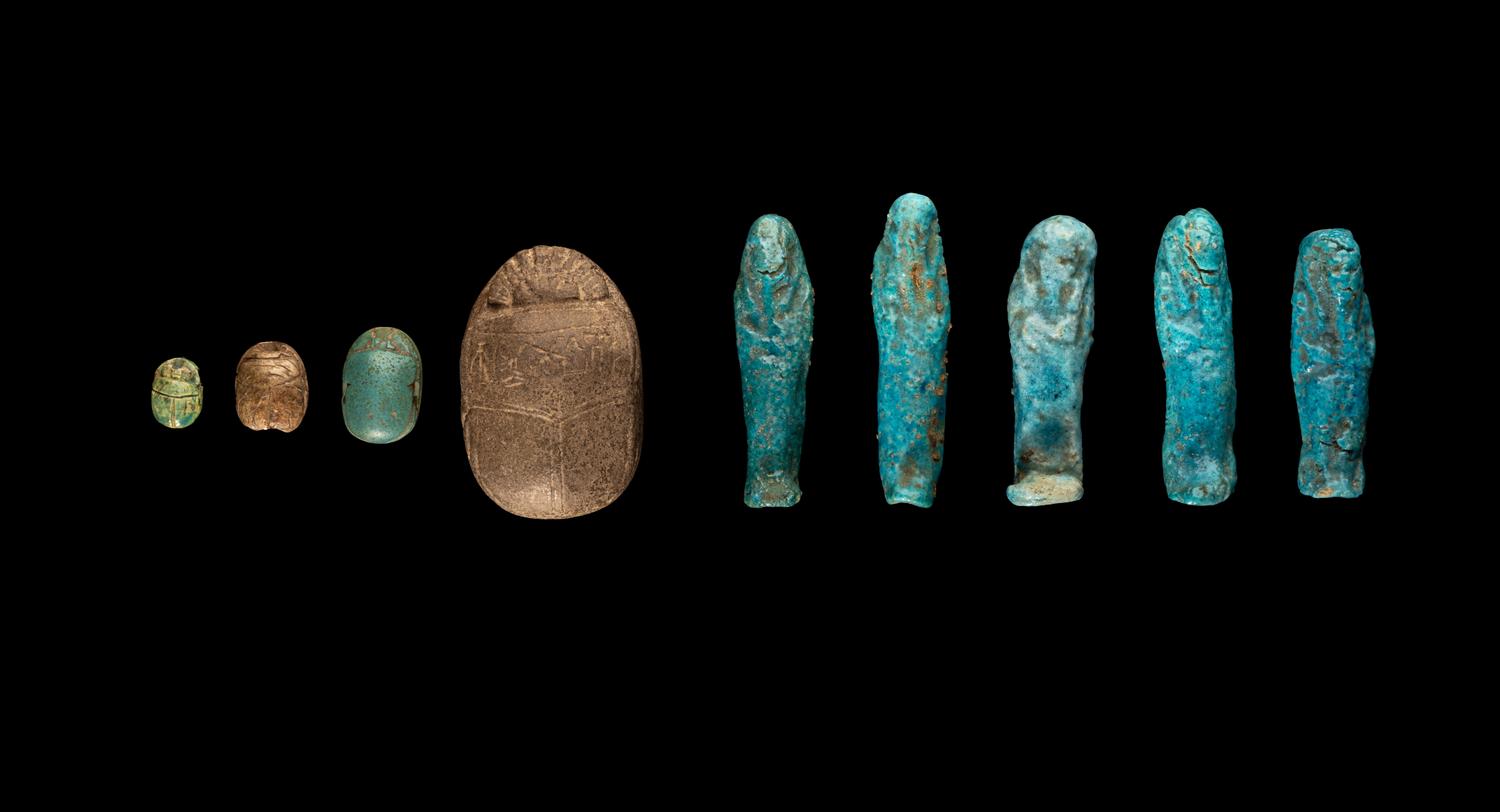 Five Egyptian Faience Ushabtis and Four Egyptian Faience and Stone Scarabs