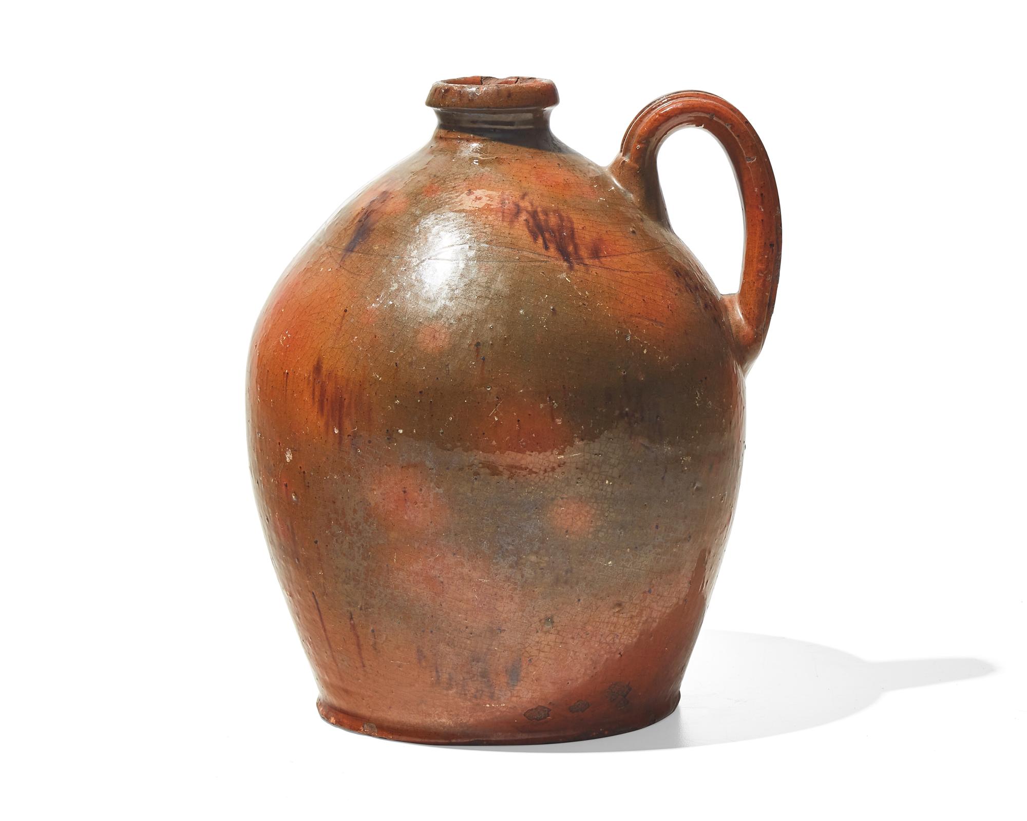 A Green and Yellow-Glazed Incised Redware Jug, 19th Century
