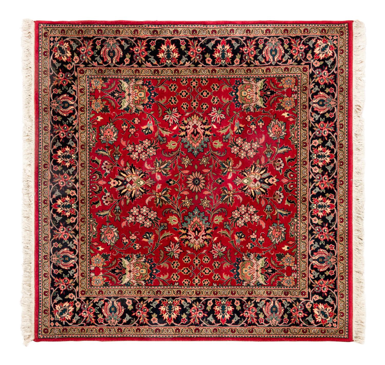 A Group of Persian Wool Rugs