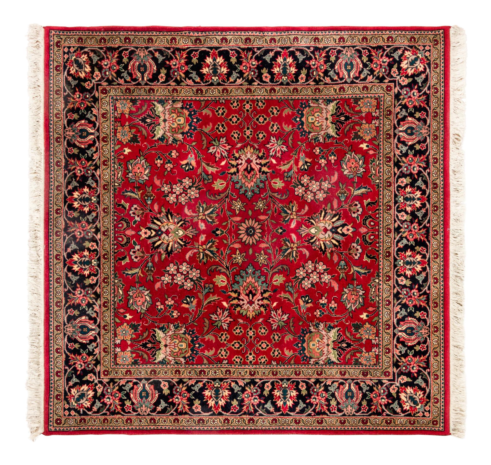 A Group of Persian Wool Rugs