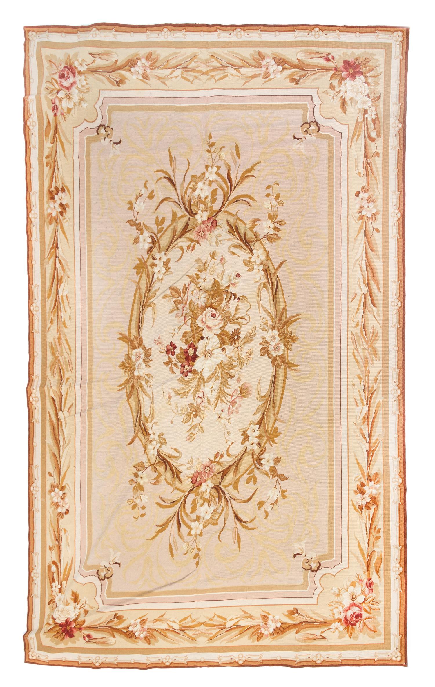 An Aubusson Wool Rug, 9 feet 2 inches x 6 feet 1 inch.